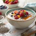 Delicious chia pudding topped with fresh berries and honey, a nutritious breakfast option.